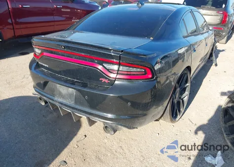 2015 Dodge Charger Road/Track z USA, uszkodzony, nr VIN 2C3CDXCT2FH857865